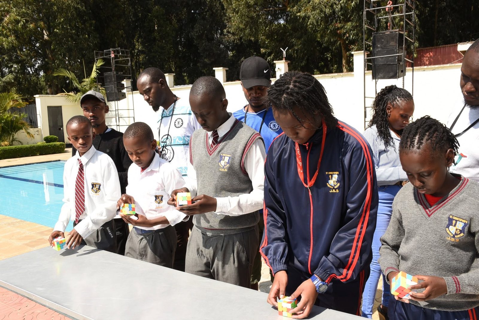 Students demonstrating speed-solving a Rubik’s cube